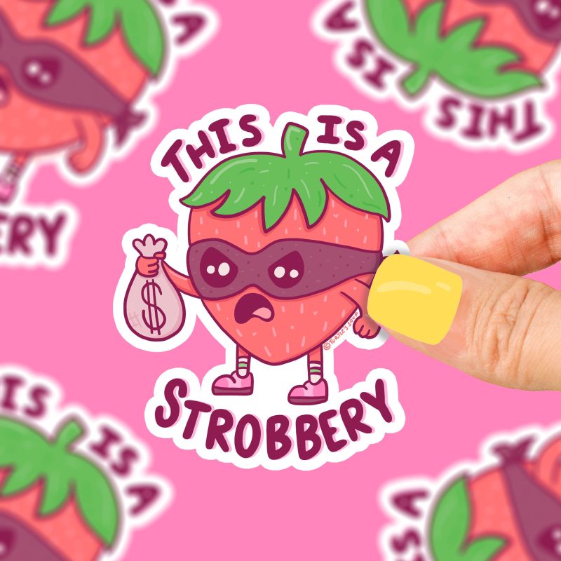 this is a strobbery funny strawberry pun robbery robber funny bandit sticker by turtles soup sticker art